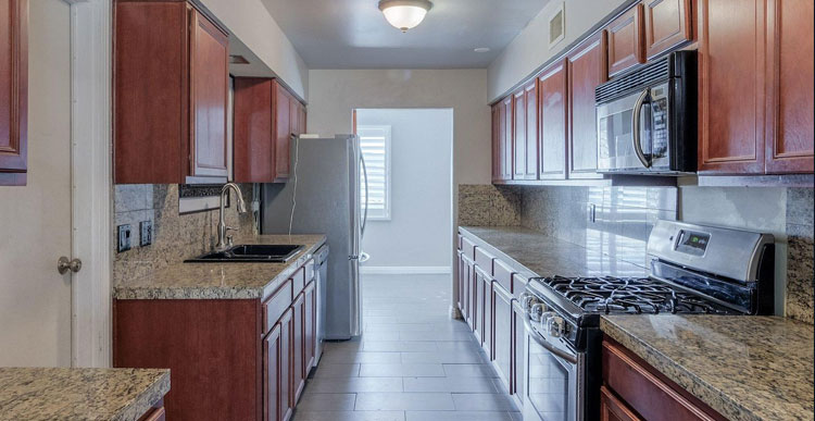 Custom kitchen layout with elegant cabinetry and stylish backsplash in Union City.