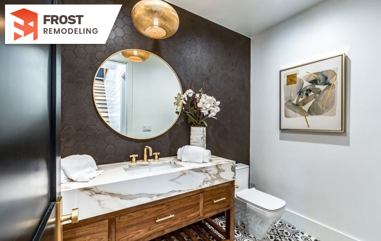 Compact powder room with bold color, modern vanity, and ambient lighting.