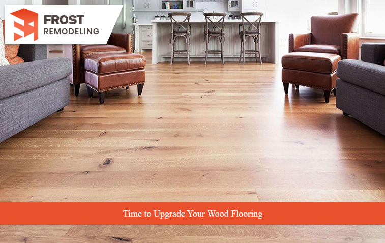 Wood flooring with visible damage and wear